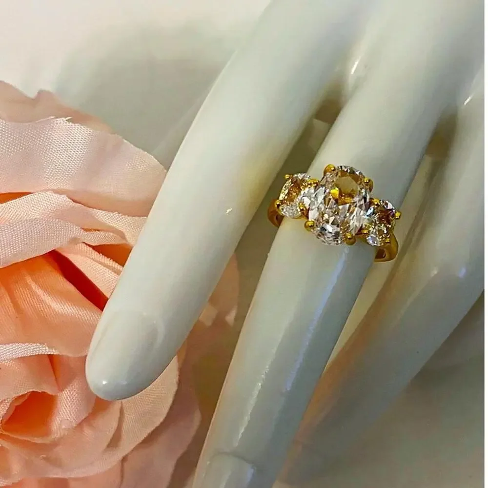18k gold plated ring with 3 prong CZ diamonds